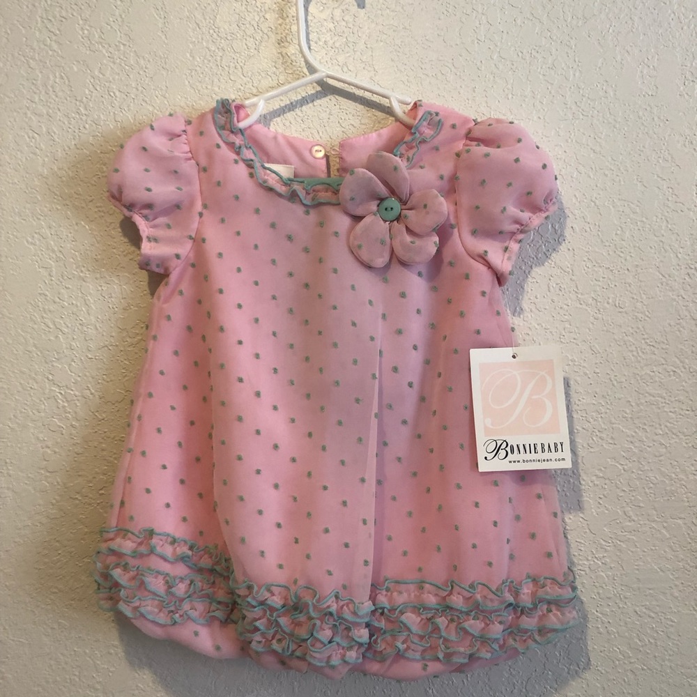 Adorable pink and green matching outfit, top and leggings. Brand new with tags!